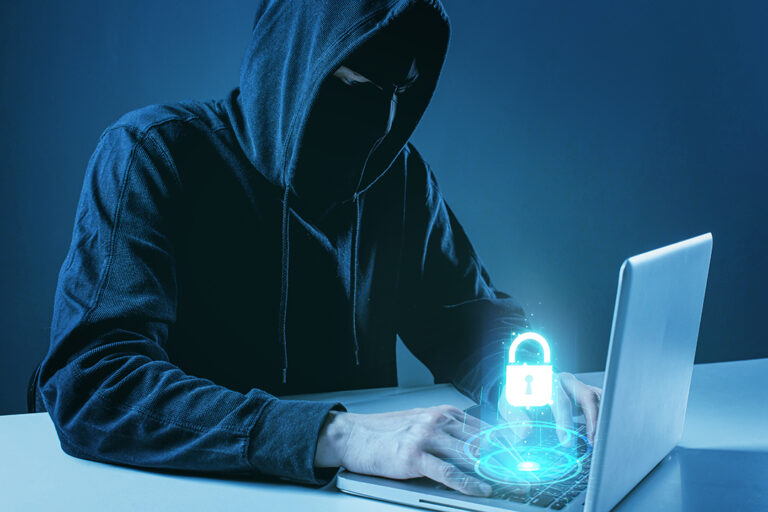 hacker committing cyber fraud